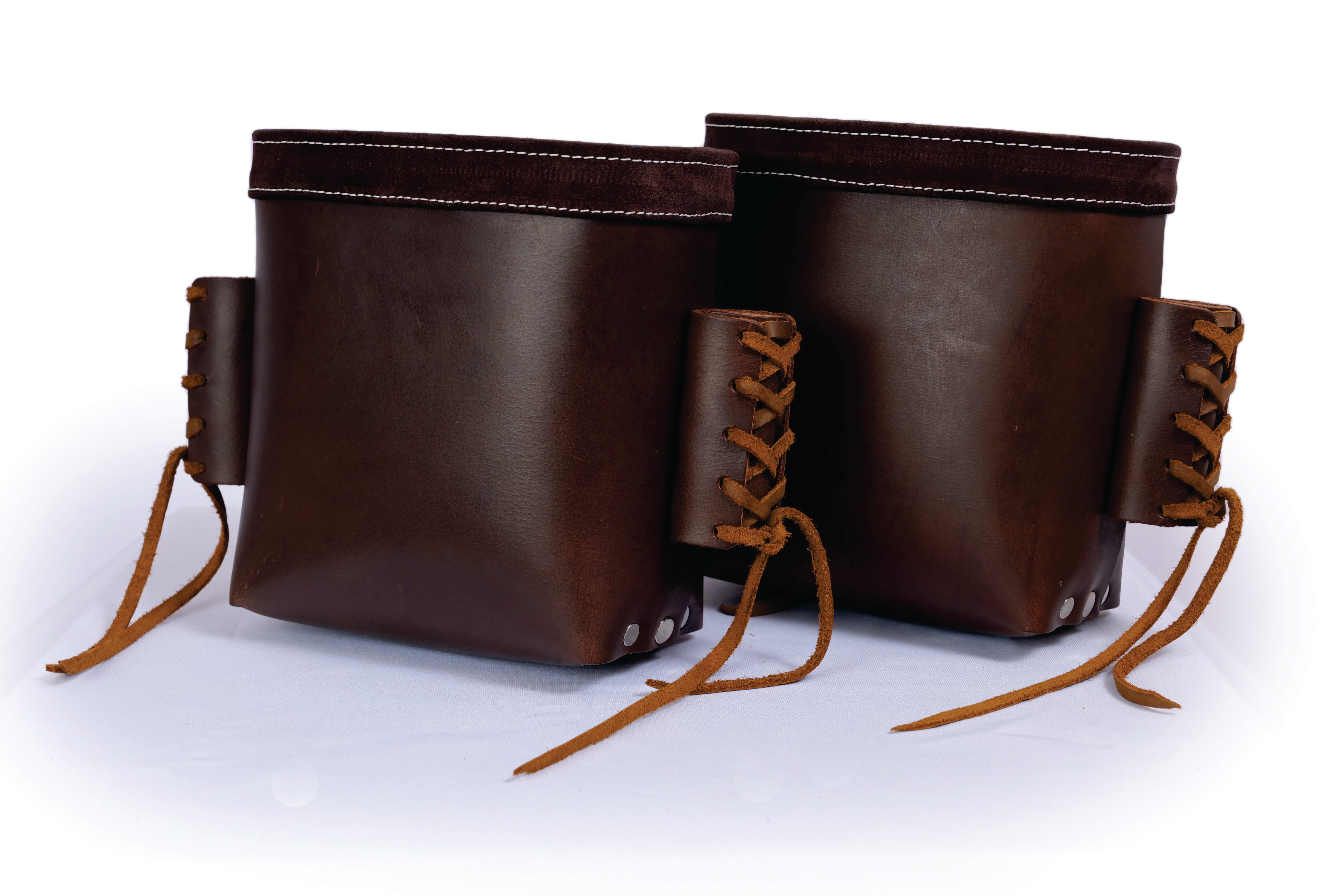 Set of brown bolt bags.